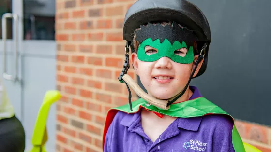 young student smiling wearing fancy dress